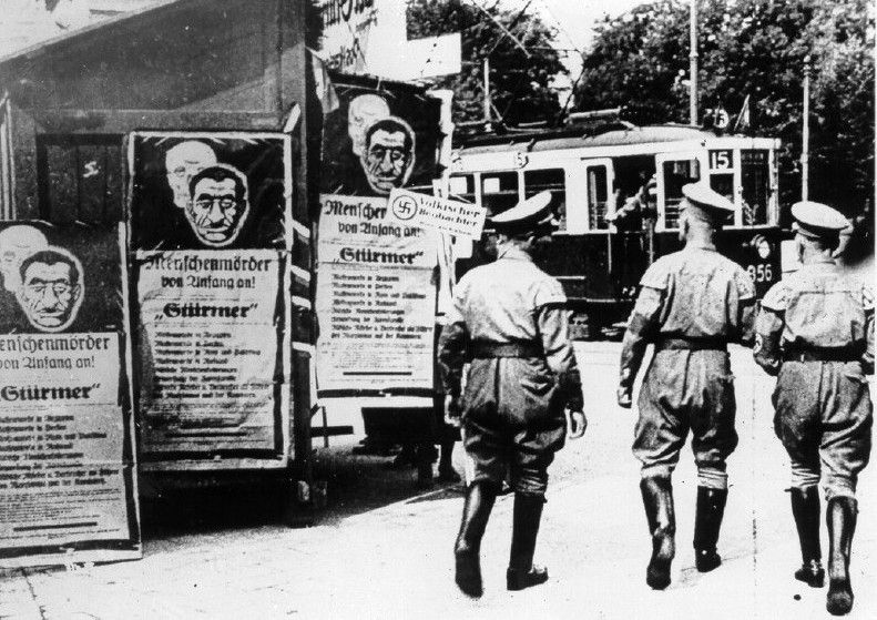 Der Sturmer posters on street corners in Germany